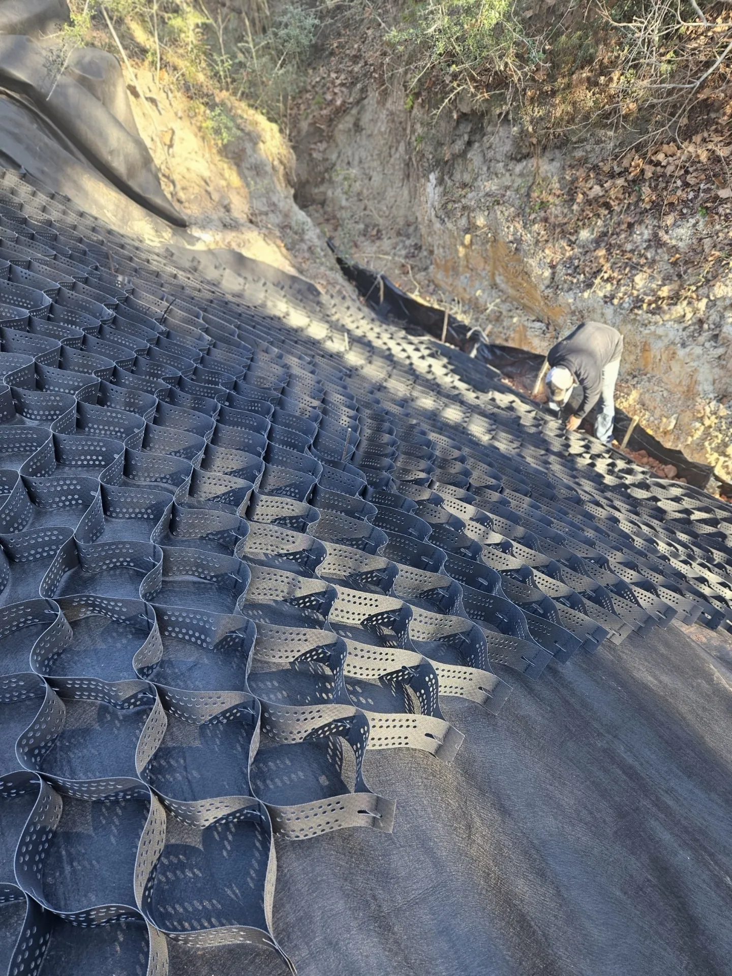 Paver installation progressing up the slope